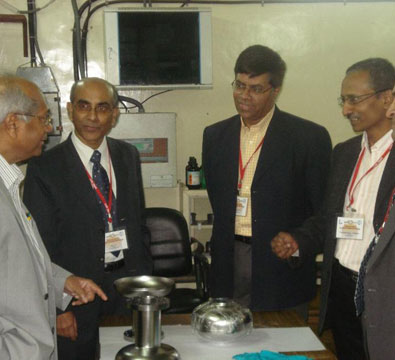 Visit by Dr Srikumar Banerjee, Chairman-DAE, to see the 1.3 GHz TESLA-type niobium cavities developed jointly by RRCAT and IUAC (February 2011).